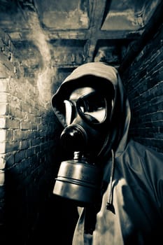Bizarre portrait of man in gas mask