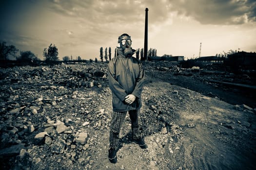 Bizarre portrait of man in gas mask