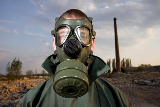Bizarre portrait of man in gas mask
