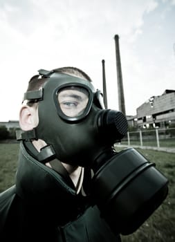 Bizarre portrait of man in gas mask