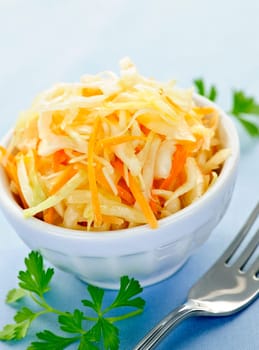 Bowl of fresh coleslaw with shredded cabbage
