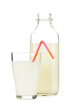 Isolated glass and bottle of nutritious white milk with straw