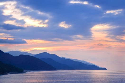 Sunset over mountains on Pacific coast near Puerto Vallarta, Mexico