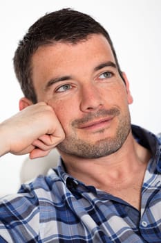 beautiful man relax on sofa at home