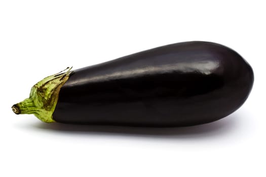 Fresh eggplant closeup on white background