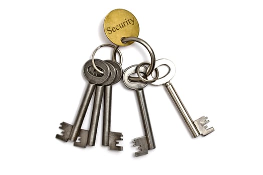 A bunch of old keys isolated on white background