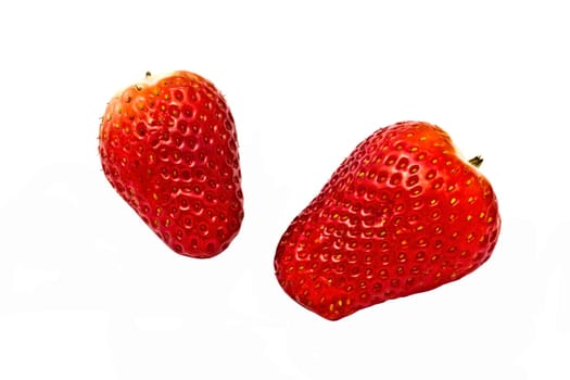 Fresh strawberries closeup on white background