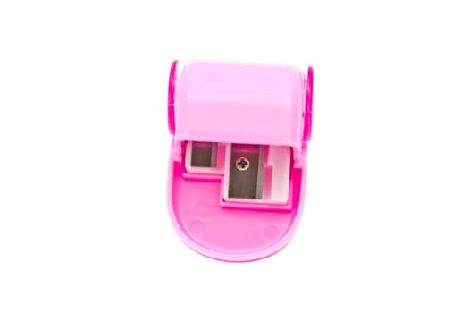 Pink pencil sharpener isolated on white background