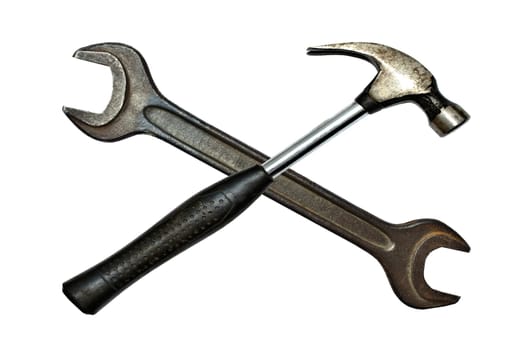 Hammer and wrench isolated on white background