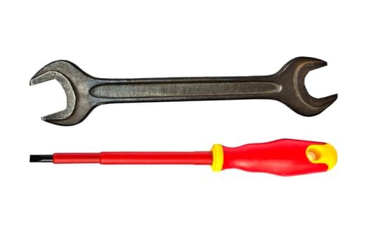 Screwdriver and wrench closeup on white background