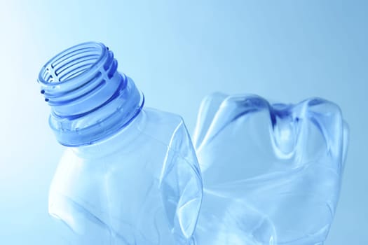 Empty plastic water bottle. Recycle garbage.