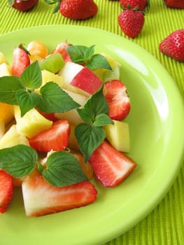 Fruit plate decorated with honeydew melon sage