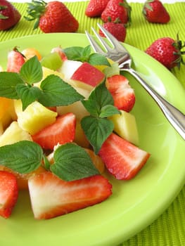 Fruit plate decorated with honeydew melon sage