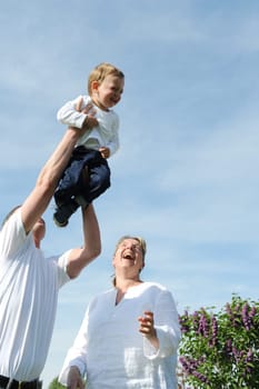 Happy young family with toddler