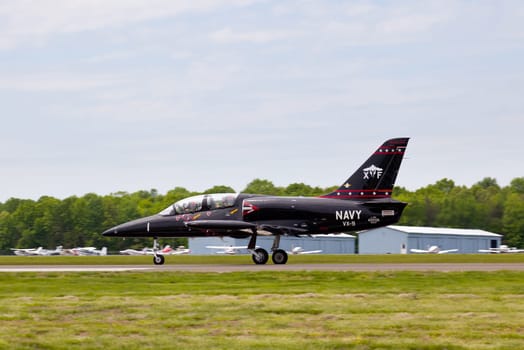 Jet airforce Albatros L-39 fighter training aircraft taking off on runway