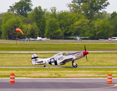 P-51 Mustang air force plane taking off at airshow