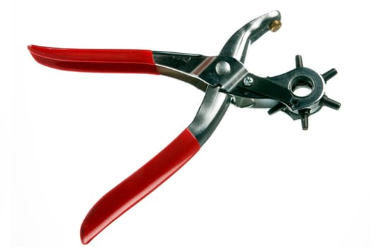 Tool used to pierce belts and shoes with white background