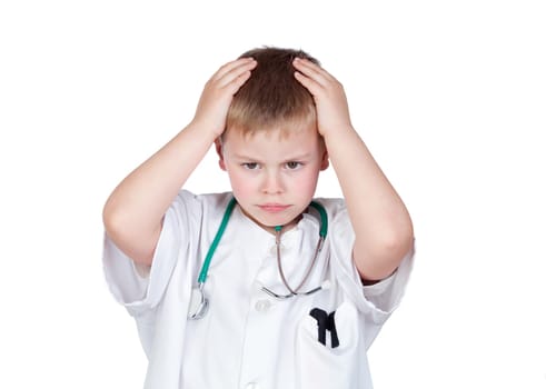 Worried child with doctor uniform isolated on white