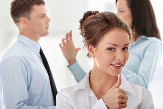 Young business woman gesturing