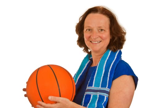 Middle-aged woman with basketball isolated on white background