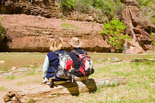 Active retired couple enjoying the view of the river