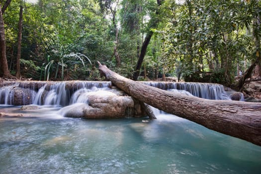 beautiful waterfall cascades in erawan kanachanburi thailand