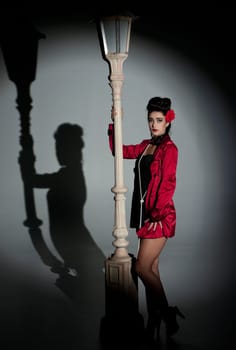 beautiful young glamorous woman  with lightpole