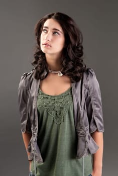 beuatiful young fashion teenager on dark gray