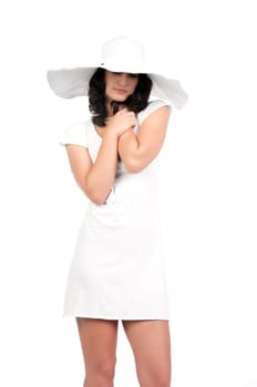 beautiful young fashion woman in white dress and hat