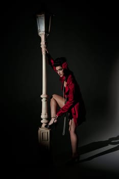 beautiful young glamorous woman  with lightpole