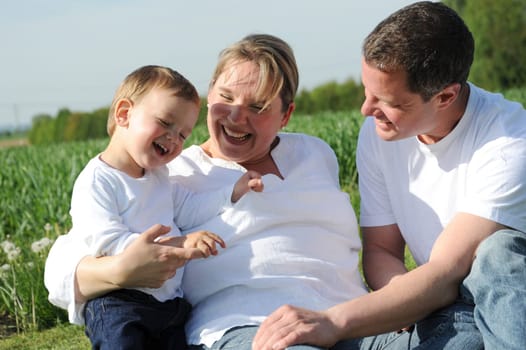 Happy young family with toddler