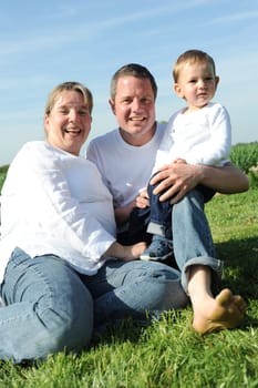 Happy young family with toddler