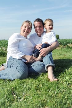 Happy young family with toddler