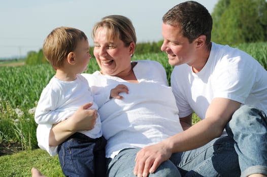 Happy young family with toddler