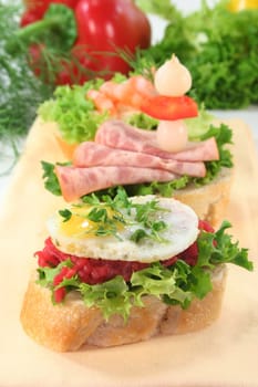 Various colorful canapés on a napkin