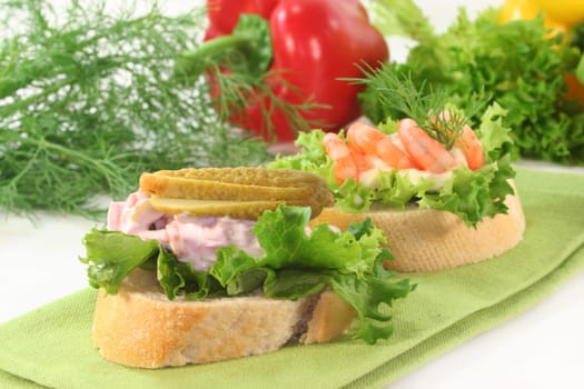 Various colorful canapés on a napkin