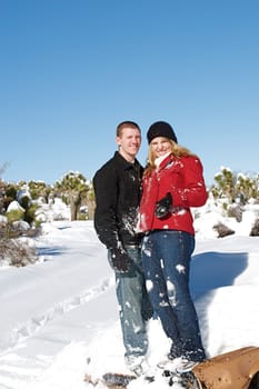 Young people enjoy a fresh snow fall