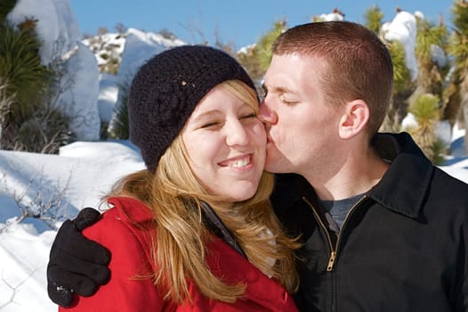 Young people enjoy a fresh snow fall