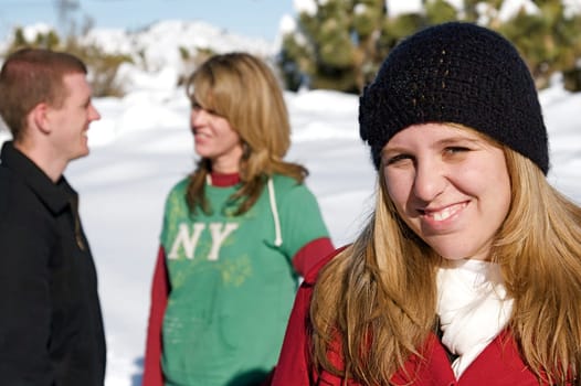 Young people enjoy a fresh snow fall