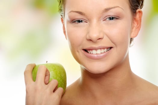 Caucasian beauty with green apple.