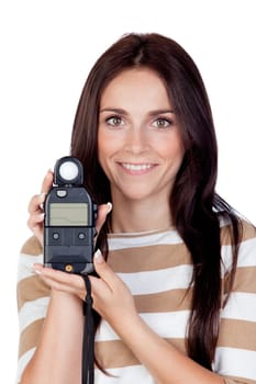 Beautiful brunette girl with a photometer isolated on a over white background
