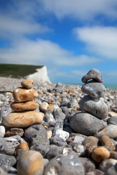 Two stacks of pebble stones on beach