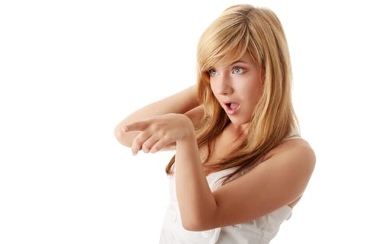 Surprised young beautiful teen girl isolated on white background