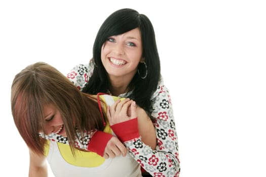 Two teen sisters isolated on white background