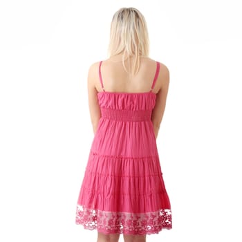 Young beautiful girl in short summer pink dress isolated on white