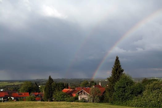The rainbow over the church