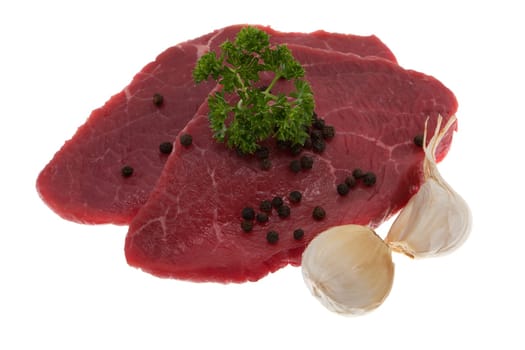 Beef,juicy raw rump steak against white background