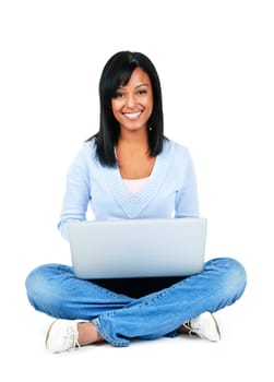Happy black woman sitting with computer isolated on white background