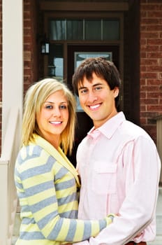 Young happy couple in love at home