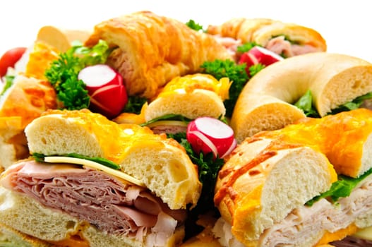 Assorted platter of sandwiches with meat and vegetables